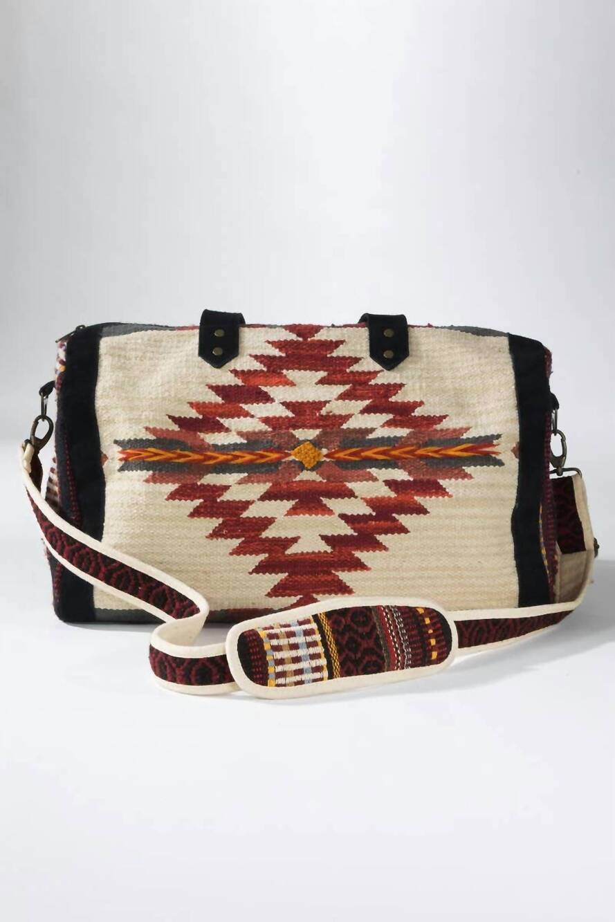 NEW URBANISTA women's handwoven navajo pattern duffel bag with suede straps in a